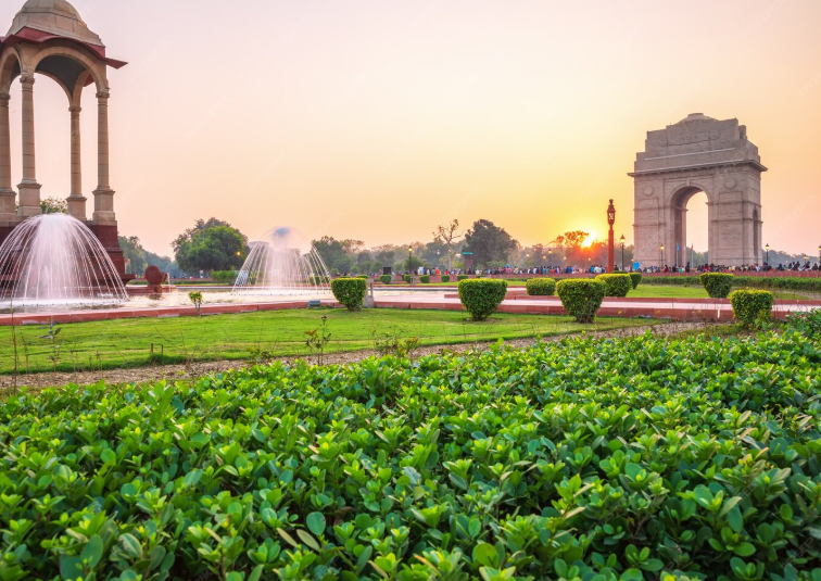 India Gate Delhi at sunset Beautiful India Gate images with fountains India Gate architecture with garden view Evening view of India Gate war memorial India Gate night view starting at dusk Scenic fountains near India Gate Delhi Lush green lawns at India Gate monument Tourists enjoying India Gate sunset view Iconic India Gate with water fountains Peaceful garden view at India Gate Delhi