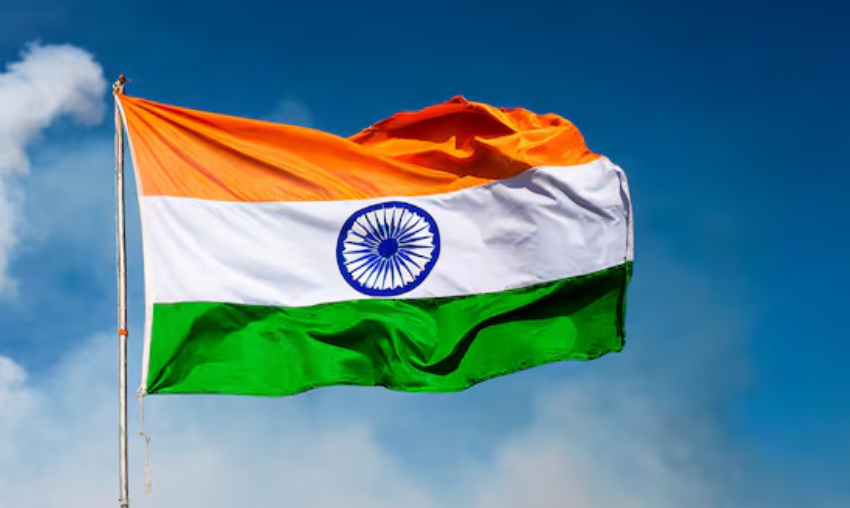 Indian national flag waving in the sky Tricolor flag of India with blue Ashoka Chakra Proud Indian flag fluttering on pole Indian national flag images with blue background Indian independence tricolor flag photography Beautiful Indian flag waving against clear sky Patriotic Indian flag photo with Ashoka Chakra National flag of India flying high India tricolor flag representing unity and pride Indian flag images for Independence Day and Republic Day