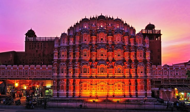 Hawa Mahal Jaipur at sunset Hawa Mahal Rajasthan evening view Illuminated Hawa Mahal palace night shot Jaipur Palace of Winds with lights Stunning Hawa Mahal architecture in Jaipur Front view of Hawa Mahal Rajasthan Beautiful Hawa Mahal palace lit up Iconic Jaipur Palace of Winds evening Hawa Mahal Jaipur colorful evening sky Heritage Hawa Mahal Rajasthan night view
