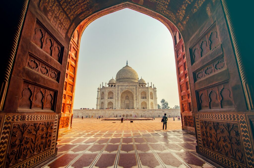Taj Mahal Framed View Agra India Mausoleum Mughal Architecture Arch Marble Dome Landmark Seven Wonders World Historical Monument India Symmetry Taj Mahal Red Sandstone Gateway Indian Heritage Site Tourism Agra Fort
